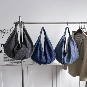 Three minimalist denim hobo bags in charcoal, navy and medium blue, large capacity style