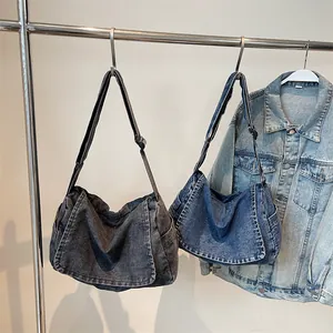 Retro denim crossbody messenger bag with large capacity and adjustable strap in blue and grey