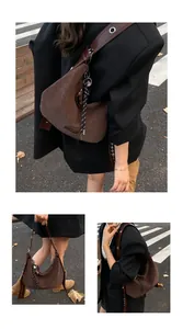 Detail of coffee brown frosted hobo bag with woven rope charm and wide leather shoulder strap