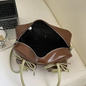 2025 stylish large bow hobo bag in brown and green with spacious interior layout
