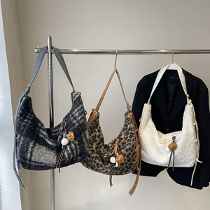 Large wool hobo bags in grey plaid, brown leopard, and white fleece with baseball charms