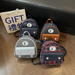 Mini vintage backpacks in four patterns including denim and plaid with bear embroidery