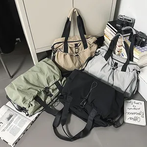 Große Reisetasche in vier Farben mit Kordelzugverschluss und festem Nylonstoff
