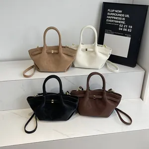 Sac à main vintage pour femme en quatre couleurs avec boucle en métal et bandoulière