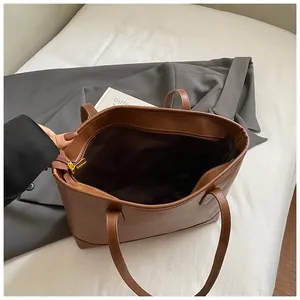 Grand sac cabas en cuir marron avec fermeture éclair pour le quotidien et les affaires