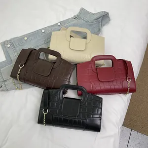 Quilted faux leather crossbody bags with gold chain straps in four classic colors