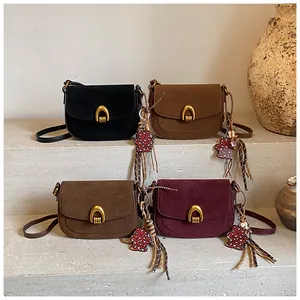 Retro suede crossbody bags in four colors with gold buckles and cute bear charms