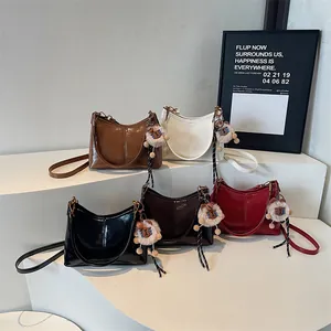 Minimalist soft leather tote bags in five colors with cute plush pendants and straps