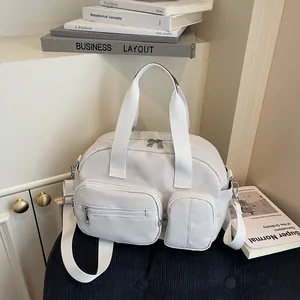 Sac bandoulière beige multi-poches en toile pour femme avec bandoulière réglable