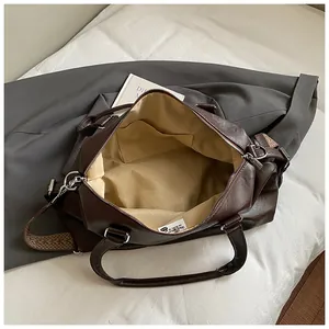 Deep brown large vintage tote bag interior view with ethnic patterned shoulder strap