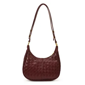 French style burgundy woven leather crescent shoulder bag with minimalist crescent design