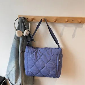 Quilted blue-purple padded shoulder bag with diamond stitch design for daily commute