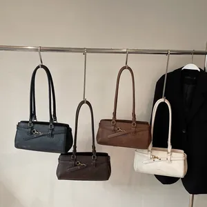 Minimalist retro underarm shoulder bags in four colors with sleek metal buckle details