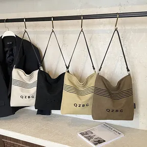 Chic canvas hobo bucket bags with letter print and thin shoulder straps in four colors