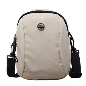 Waterproof cream oxford mini crossbody bag with black contrast strap for women