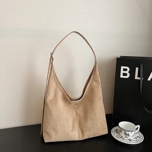 Minimalist large capacity khaki suede tote bag with V-shaped opening and shoulder strap