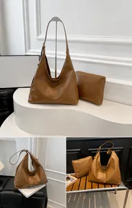 Brown leather tote bag set with matching pouch and adjustable shoulder strap for women