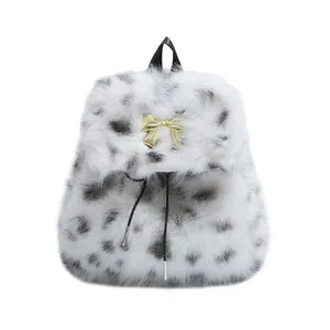 Stylish plush backpack with black and white spotted faux fur and golden bow buckle