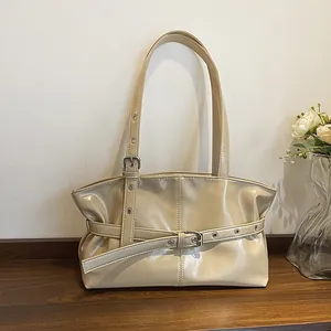 Vintage beige PU leather shoulder bag with glossy finish and silver metal buckle details