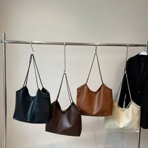 Minimalist faux leather tote bags in four colors with metallic chain shoulder straps
