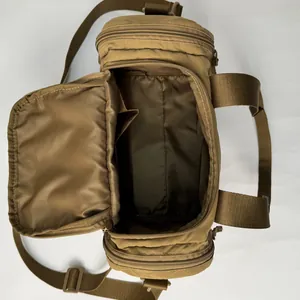 Large khaki cylinder travel tote with wide adjustable strap and spacious interior