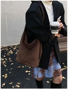 Chic coffee brown suede tote bag styled with casual autumn street fashion look