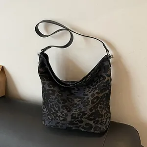 Fashionable dark leopard print canvas hobo bucket bag with black leather strap