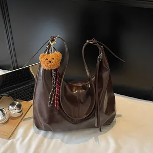 Retro dark brown large hobo shoulder bag with a cute plush bear charm for women