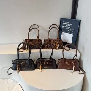 Retro shoulder bags in diverse colors and leopard patterns with elegant gold buckle and beads