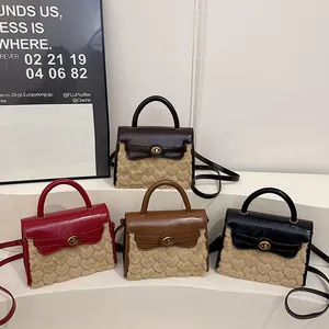 Fashionable heart-textured fuzzy crossbody bags in four colors with leather details