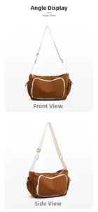 Detail view of caramel nylon crossbody bag with white trim and adjustable strap