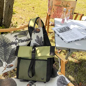 Outdoor leisure flap backpack in olive green and black with a stylish checkered pattern