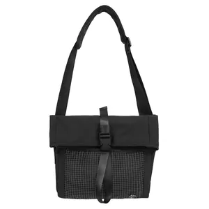 Minimalist black roll-top messenger bag with white grid front pocket and adjustable strap