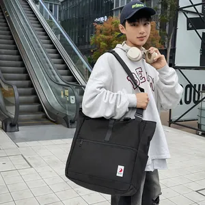 Minimalist black large capacity messenger bag for students with adjustable strap