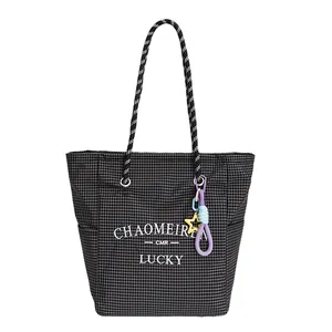 Large capacity black and white checkered canvas tote bag with woven handles and star charm