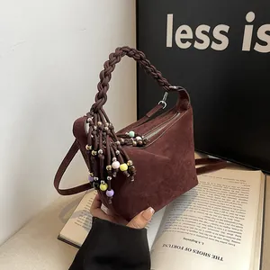 Retro brown suede handbag with woven handle and colorful beaded tassels for women