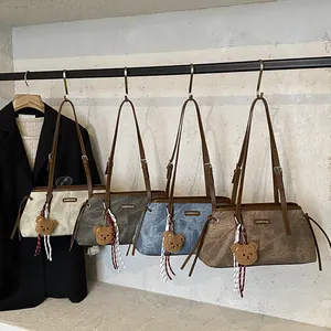 Chic commuter shoulder bags in beige, grey, denim blue and brown with bear charm