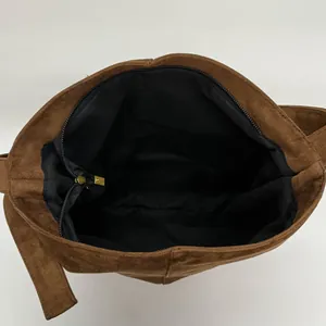 Brown vintage suede tote bag with large capacity interior and secure zipper closure