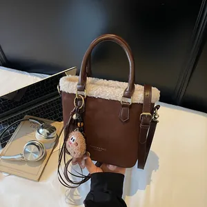 Women Vintage Suede Shoulder Bag Plush Trim Large Capacity Bucket Bag With Adjustable Strap And Cartoon Pendant Handbag