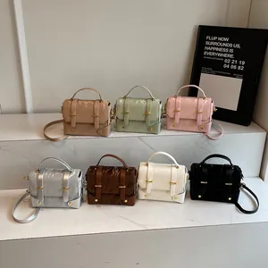 Chic textured square handbag collection in seven colors with gold hardware and shoulder strap