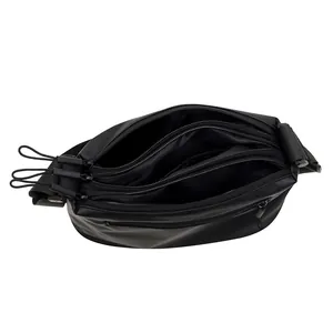 Minimalist black multi-zipper crossbody bag with spacious triple compartments for storage