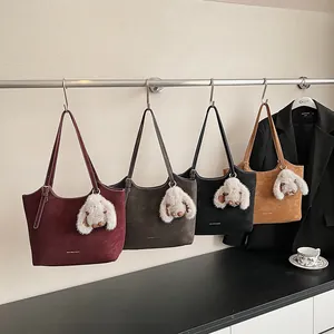 Retro shoulder tote bags in four colors with cute rabbit charms and matte texture