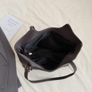 Deep coffee vintage tote bag with large capacity interior and contrast stitching