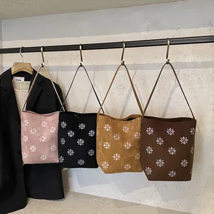 Borsa tote minimalista con ricamo fiocco di neve in quattro colori su asta nera