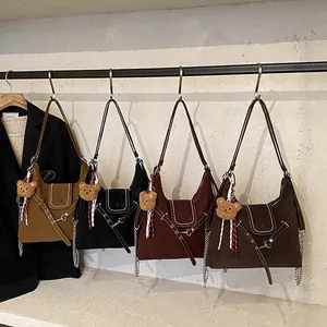 Vintage large-capacity shoulder bags in four colors with contrast stitching and bear charms