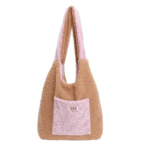 Fuzzy plush tote bag with leopard print pocket and Yes Honey label on white background