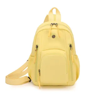 Minimalist light yellow waterproof nylon backpack with multiple zipper pockets for students