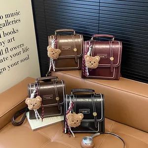 Retro faux leather backpacks for women in four colors with cute bear pendants