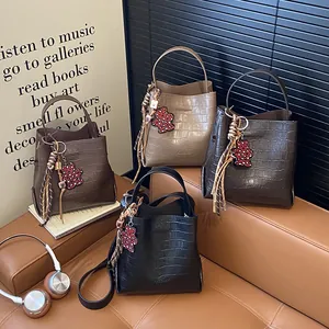 Fashionable crocodile texture bucket bag set in black, beige, coffee, and brown leather