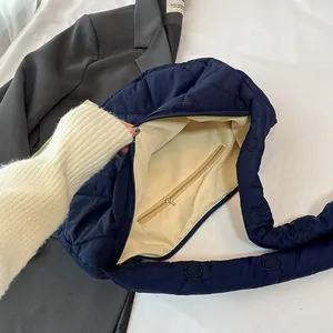 Quilted blue cloud tote bag with heart embroidery and spacious interior for autumn